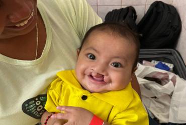 mother holding her child pre-surgery